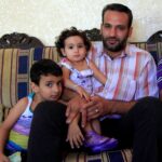 syrischer Vater mit seinen Kindern